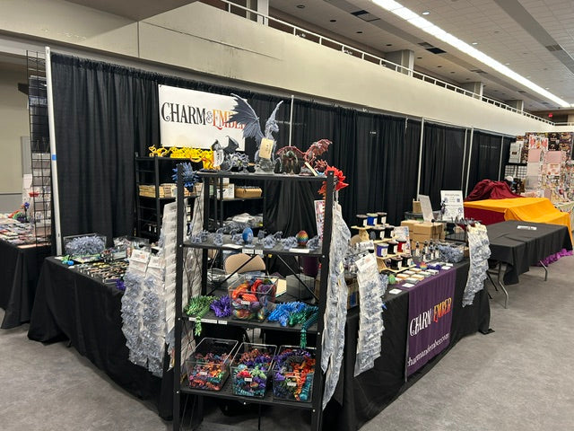 Charm & Ember tabletop miniature booth at UwU Con 2026 in Mesa Arizona