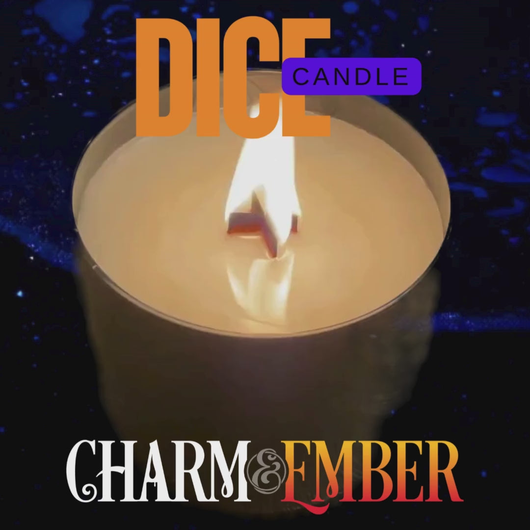 Timelapse video showing an EmberVault Dice Candle burning down to reveal a hidden set of foil-wrapped metal dice inside the wax.