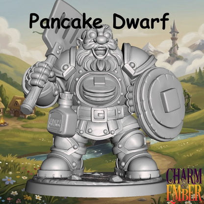 Young Adventurers Pancake Dwarf miniature for kids wearing pancake-themed armor and carrying a shield and oversized spatula, designed for fantasy tabletop RPG adventures and beginner miniature painting.